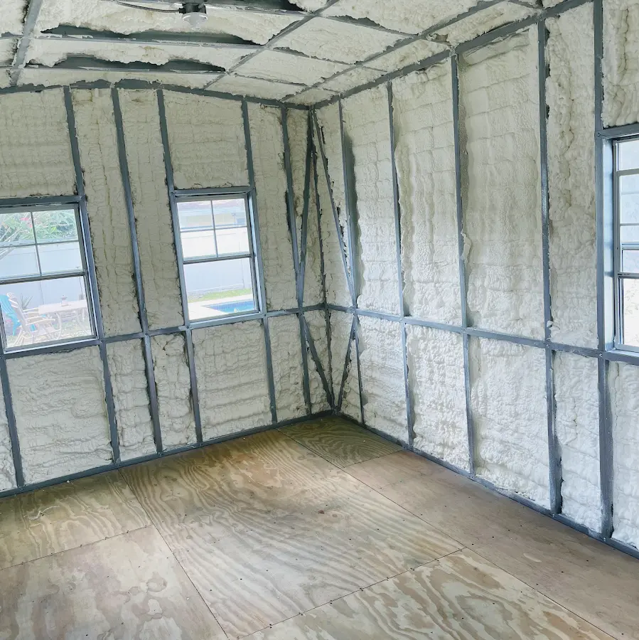 Closed-cell spray foam insulation applied to wall cavities in a residential project in Valencia West